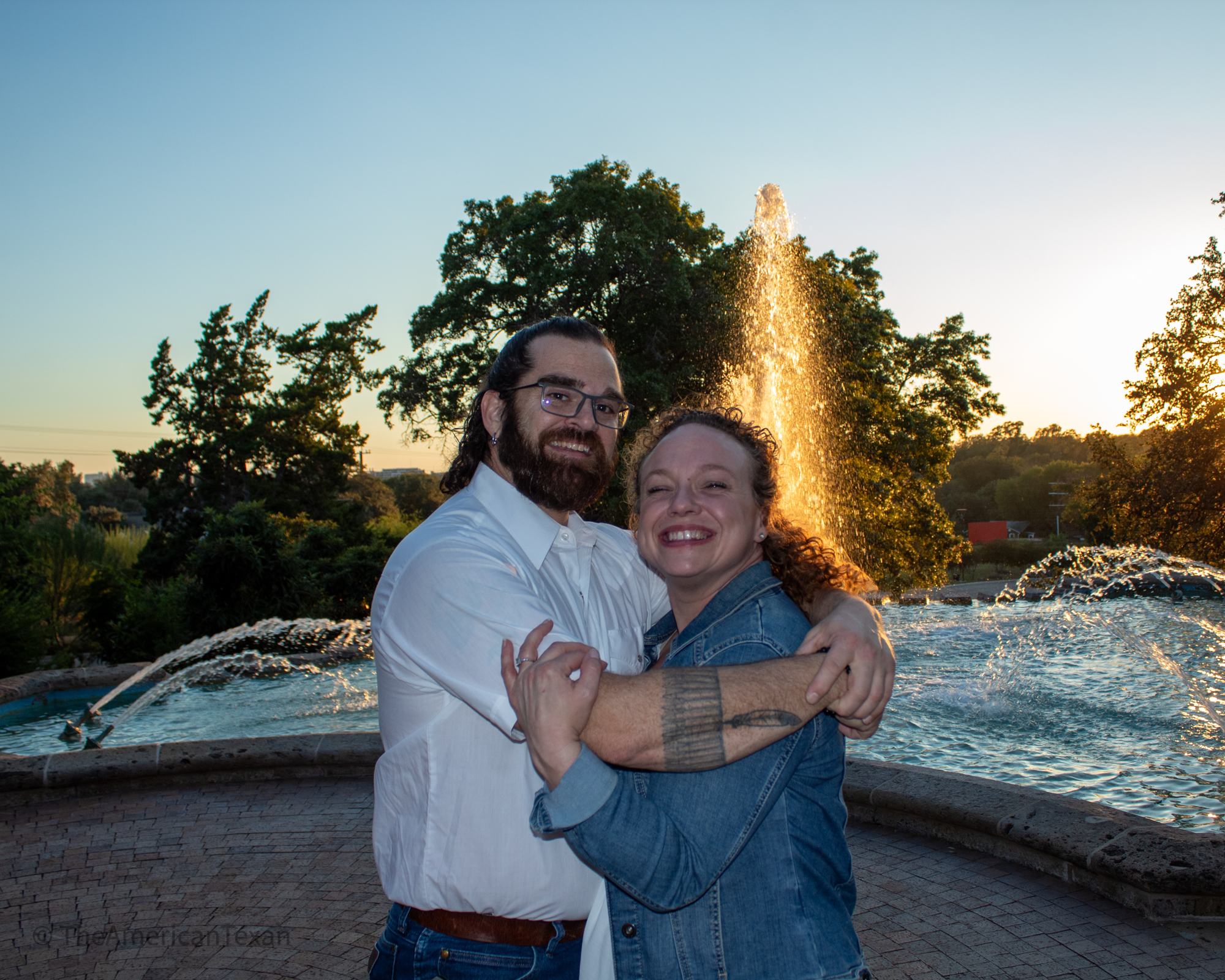 Ryan and Shannon at sunset by a fountain